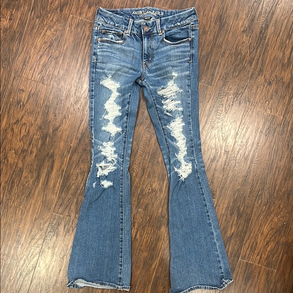 American Eagle Women's Blue Distressed Jeans (stretch) fits like a 6
